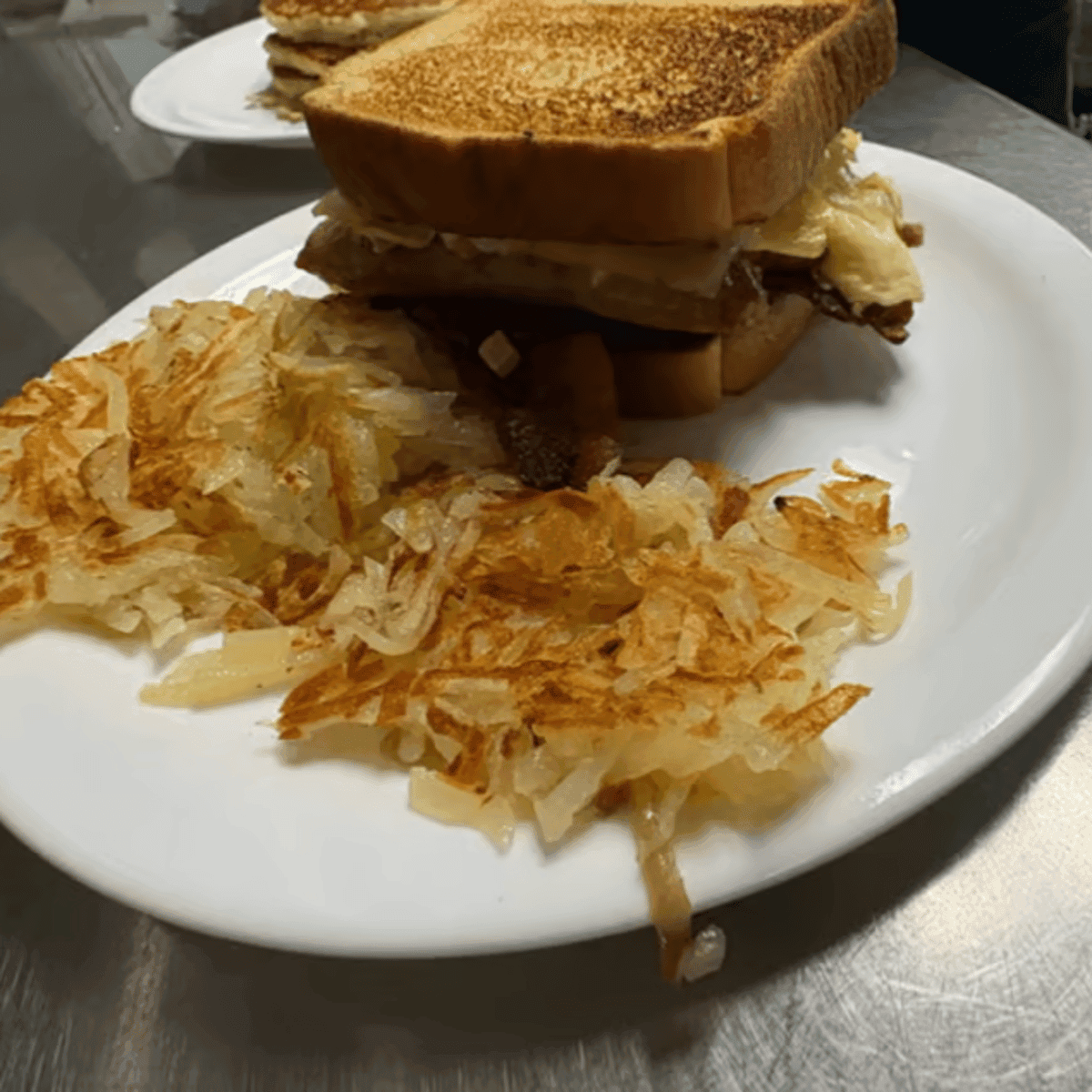 Build Your Own Breakfast Sandwich — Choose your bread, meat and cheese for an egg sandwich served with hashbrowns