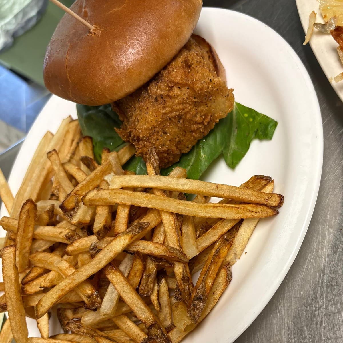 Deep Fried Fish Sandwich — Fried white fish, lettuce and tartar sauce in a sandwich